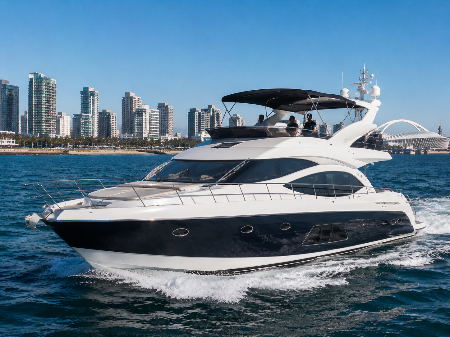 Luxury yacht on the water against the Durban skyline